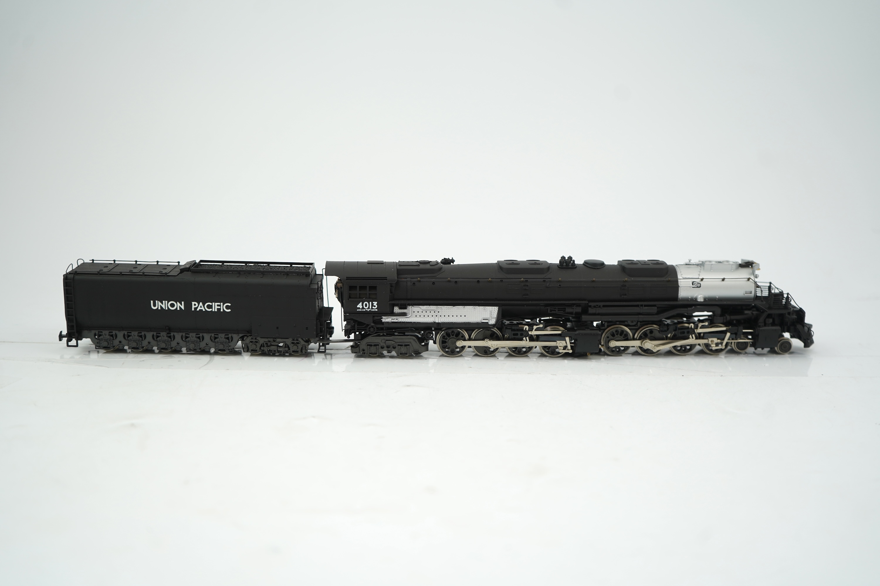 Two HO gauge Union Pacific locomotives; a Rivarossi Big Boy, 4013, 4-8-8-4 tender locomotive, together with LMB Models, Japan, 5093, 4-10-2 locomotive with bogie tender, both powered for two rail operation.